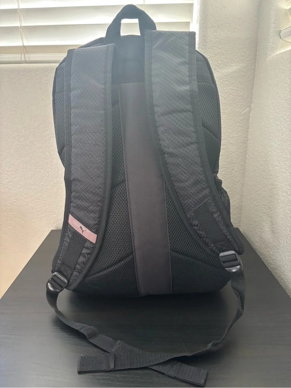 Puma Black Backpack with Copper Puma Logo